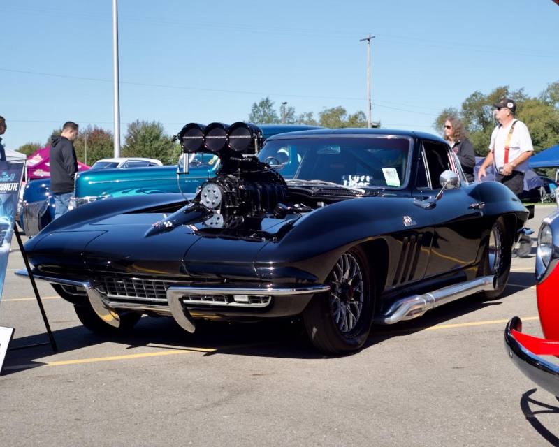 1966 Chevrolet Corvette with a supercharger through the hood