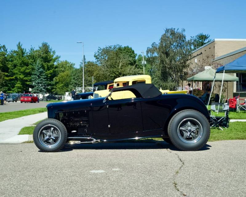 Black roadster, side profile